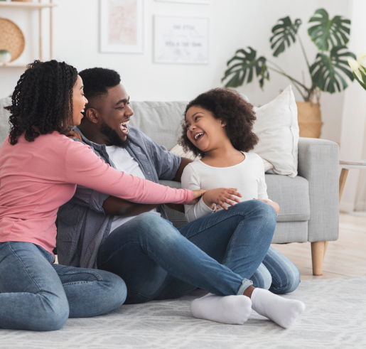 Happy father, mother and child